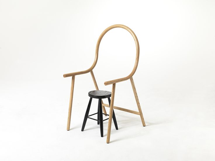 clark bardsley uses steam-bent oak to design an anti-chair