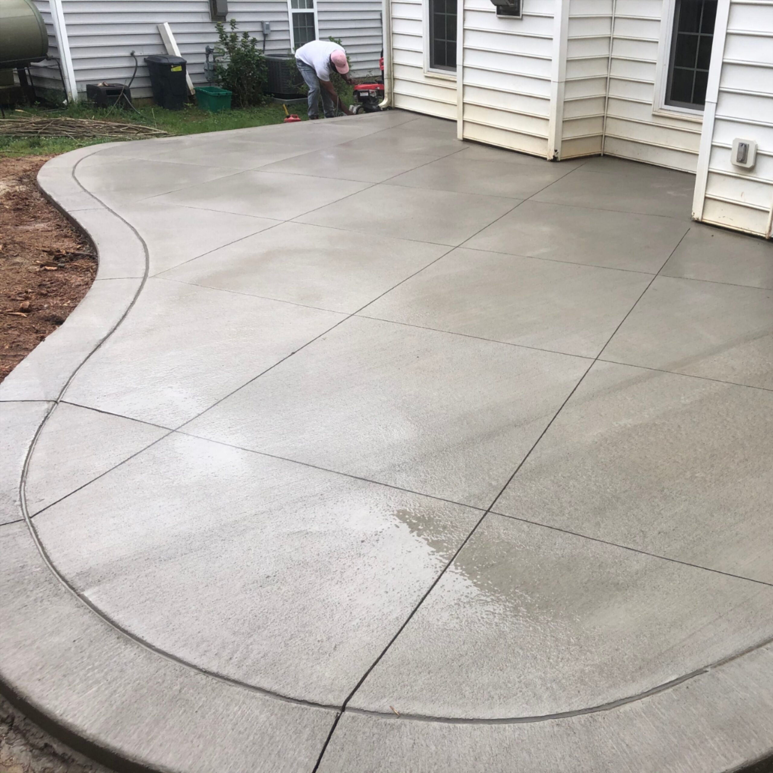 Outdoor Relaxation: Enjoying the Outdoors
with a Cement Patio and Cedar Pergola