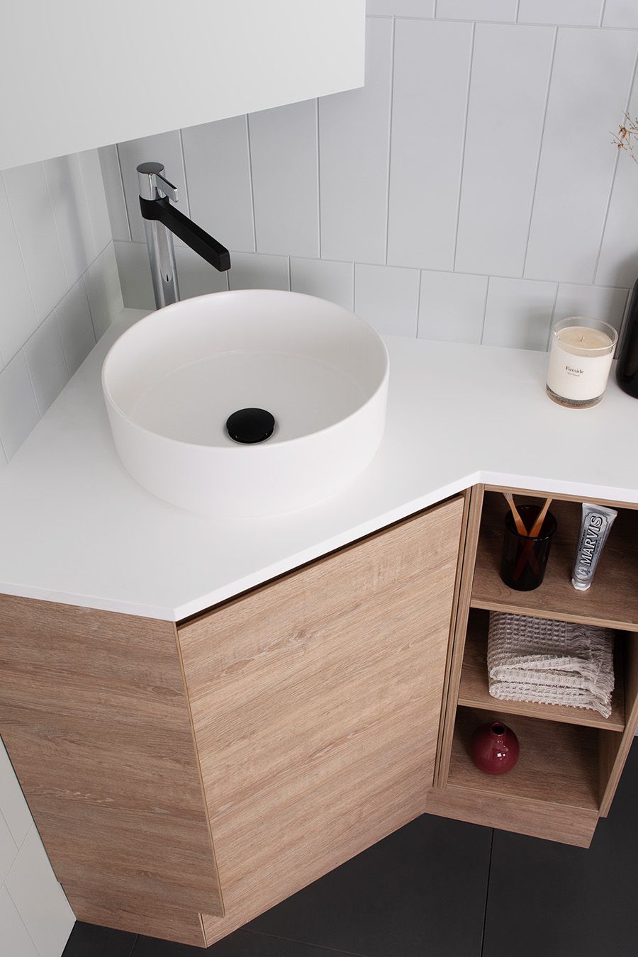 Space saving corner bathroom sink