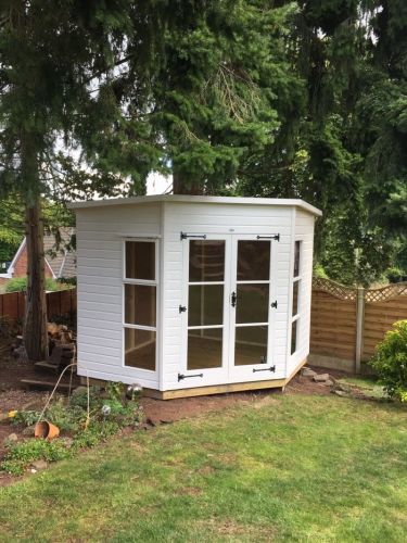 Revamp Your Unused Space into
One of the Daintiest Corner Sheds Ever