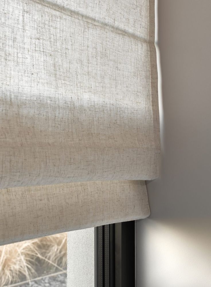 Keep the Rays away by using
Roman Blinds for your windows