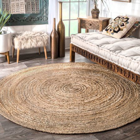 Using the round jute rug for
better looking living rooms