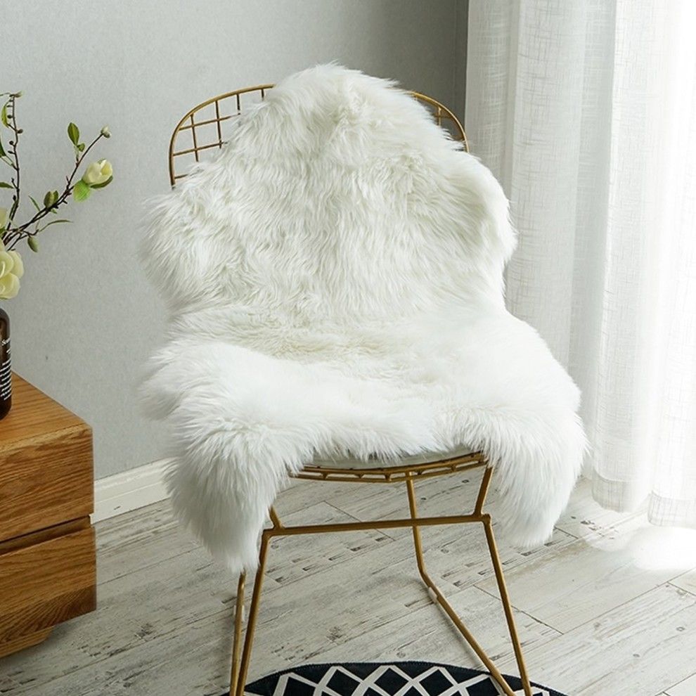 White faux sheepskin rug is a
real classic