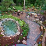 backyard garden enchanting cottage backyard with paver patio walkway, natural rock pond and DFFHQOI