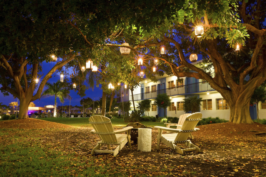 backyard lighting ideas one creative idea is to hang various contrasting lanterns from trees. in MPTEPRW