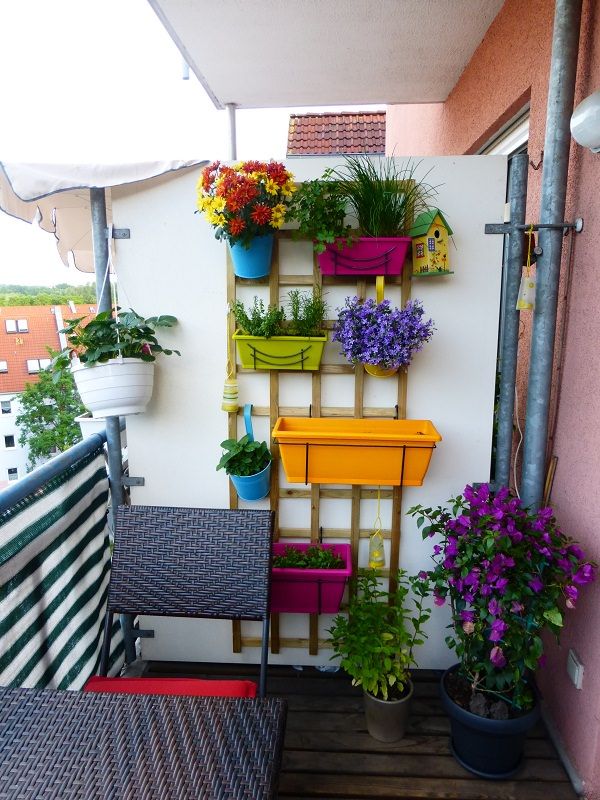 balcony garden ideas vertical balcony garden idea - colorful planters are hung on this wooden LOQKTUO