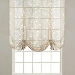 balloon shades taupe savannah sheer tie up curtain hanging on a decorative rod OAPMCEA