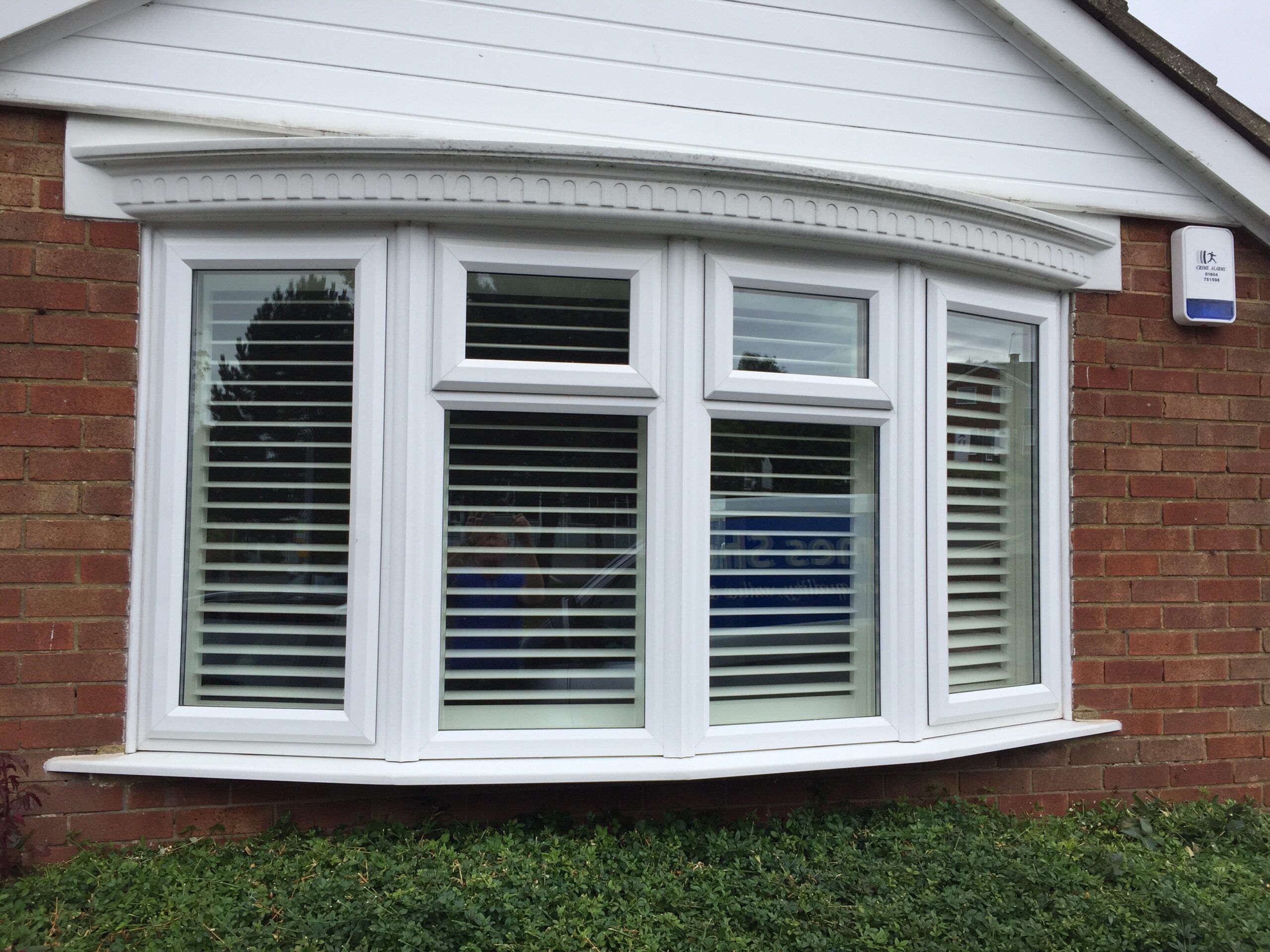 bay window shutters seen from outside house QUXCZXW