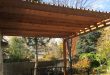 deck covers custom brown pergola cover a deck attached to house. RXVJCCN