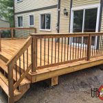 deck spindles wood deck with black metal spindle railings deck montreal metal deck OZYHWZX