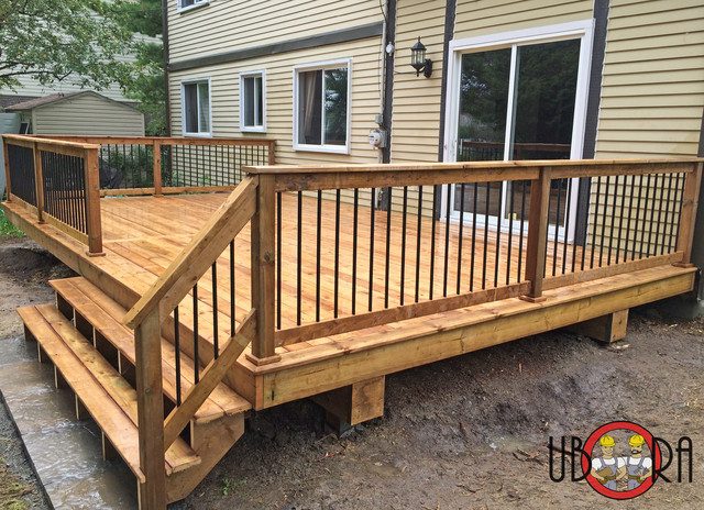 deck spindles wood deck with black metal spindle railings deck montreal metal deck OZYHWZX