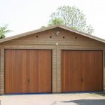 double garage with cedar up u0026 over doors in the gable end MABAXWP