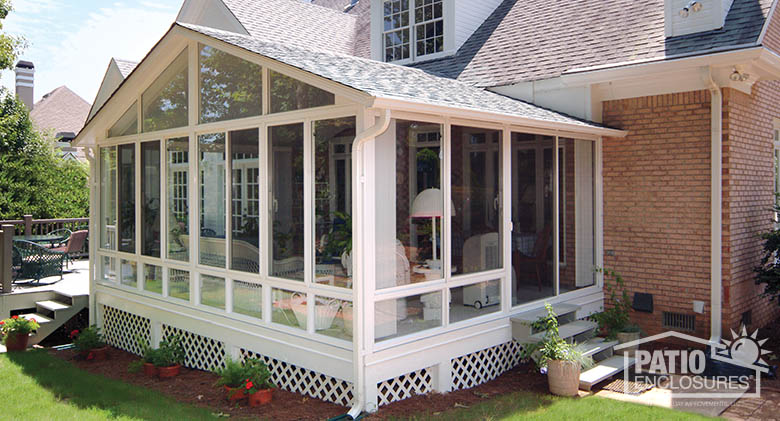 enclosed patio white aluminum frame sunroom with gable roof OZLFNWJ