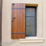 exterior wood shutters custom wood shutters in a tuscan style design mediterranean-exterior TSWBCQQ