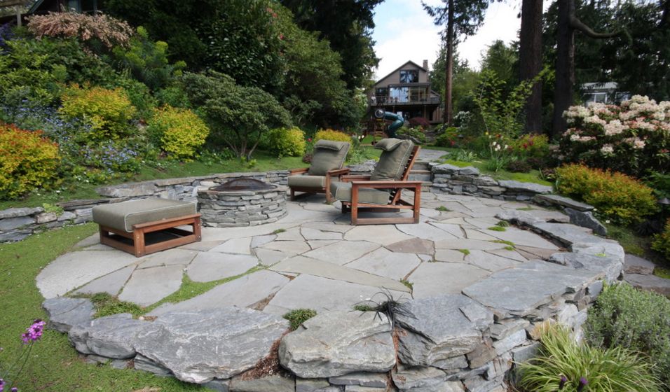 flagstone patio ... this is a contemporary patio featuring organic lines and materials LAIIRSC