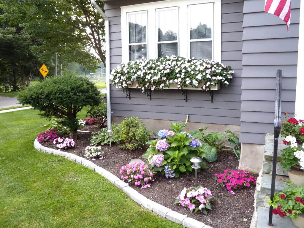 front yard landscaping ideas 1. cheerful floral border and window boxes KSYCOZS