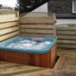 garden decking ideas garden decking with a hot tub on it QEZUJZB