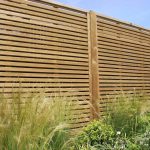 garden fence panels venetian fencing situated in a garden QYSSXPH