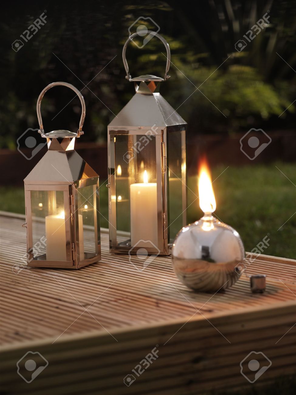 garden lanterns on a deck stock photo - 9856367 XWRUWZY