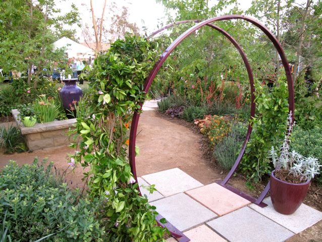 garden trellises above: the gracie modern arbor in aubergine. each sculpture is painted in ZPHOPJV