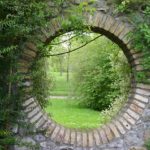 garden walls garden wall circular window SWLTJGF