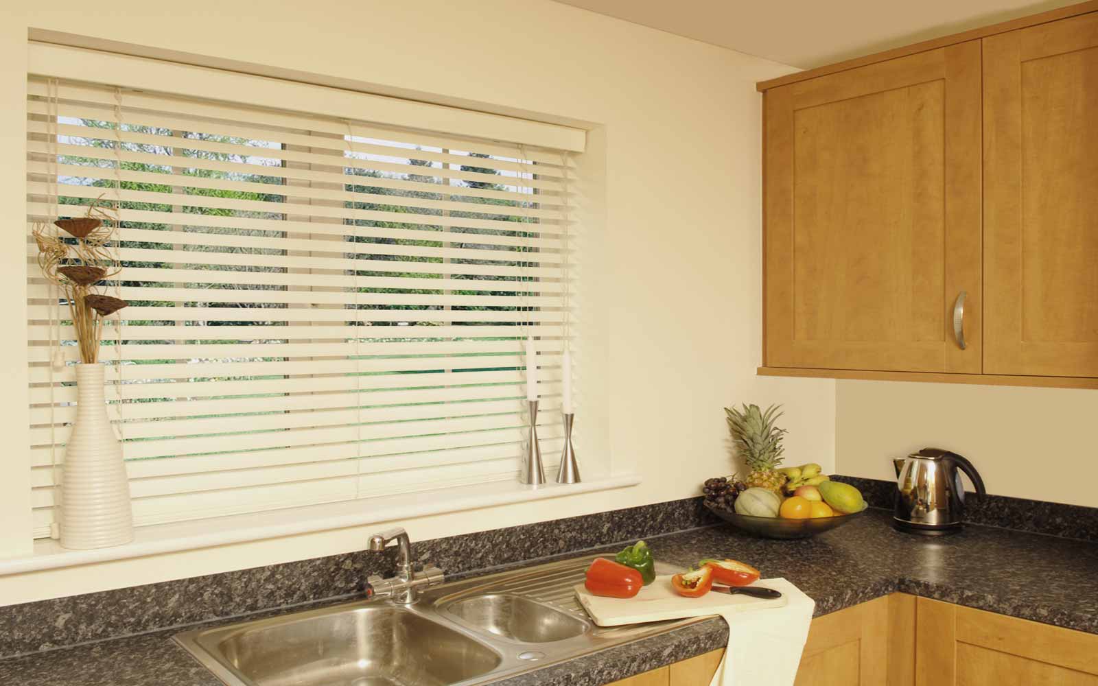 kitchen blinds faux wood venetian blinds in a kitchen KELCCXJ