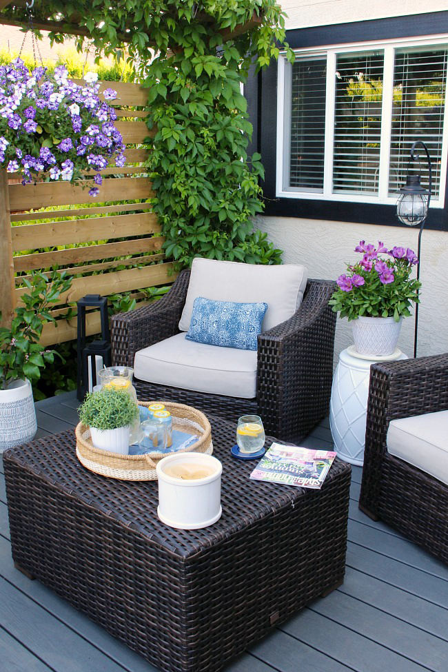 patio decorating ideas resin wicker patio furniture on a summer patio. ODOGRAK