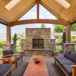 patio fireplace stone screened fireplace beneath arched wood patio XTJQNWU