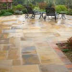 patio stones natural stone patio with garden furniture JNGRCPL