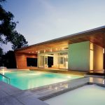 pool house designs architects hariri u0026 hariri designed this contemporary ipe-paneled poolhouse  in wilton, QMLCHKA