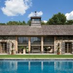 pool house ideas a rustic stone poolhouse PECWMQP