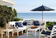 preppy navy and white patio furniture make for the perfect seaside setting. UNBYVPO