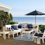 preppy navy and white patio furniture make for the perfect seaside setting. UNBYVPO