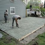 stamped concrete concrete being stamped with an ashlar slate pattern MAEZUBZ