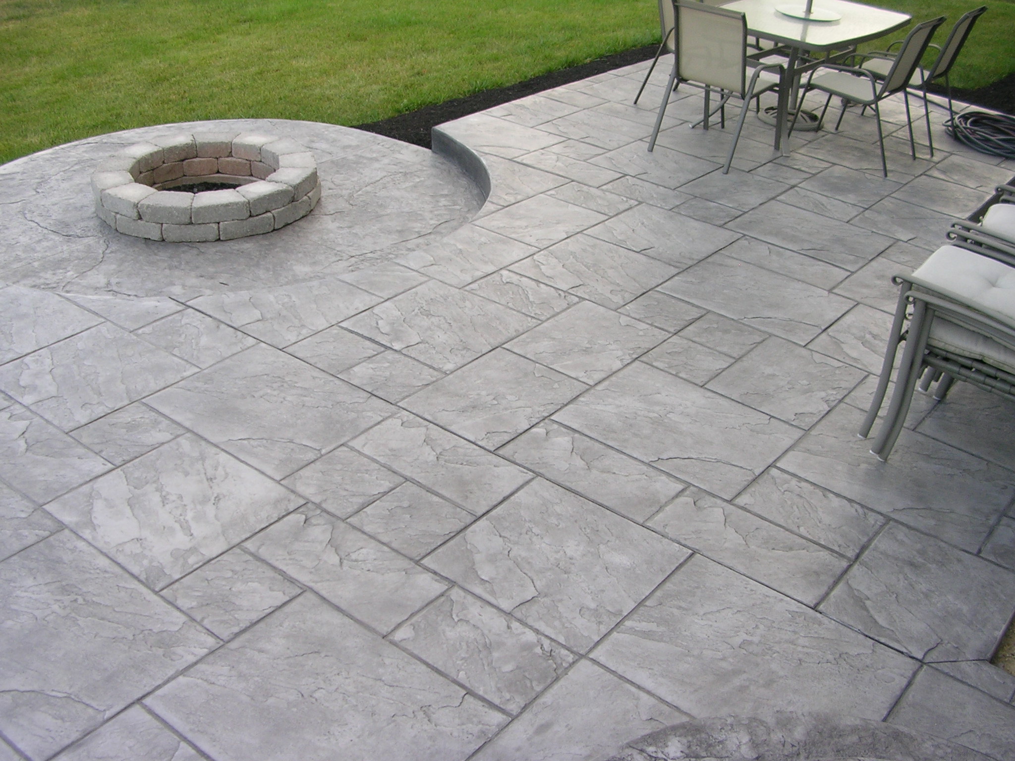 stamped concrete patio vs pavers GHDTNVV