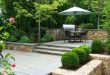 wellesley, ma - tiered stone patio with grill and boxwoods, landscape design ZDDHLXS