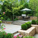 wellesley, ma - tiered stone patio with grill and boxwoods, landscape design ZDDHLXS