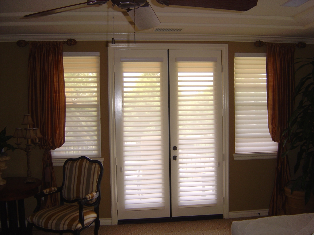 window treatments for french doors hunter douglas silhouette shades on french doors combined with drapery  treatments CORKSYW