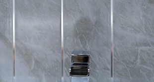 Grey marble bathroom wall panels with chrome silver strips, Cladding