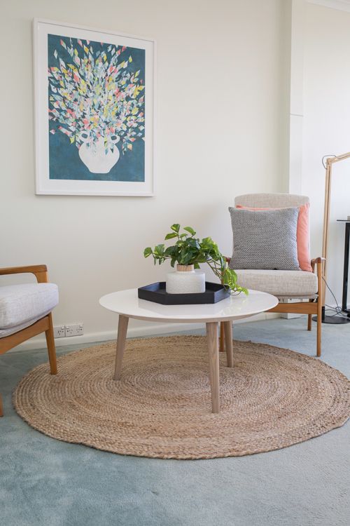 Home office, study off bedroom, round coffee table, circle jute rug