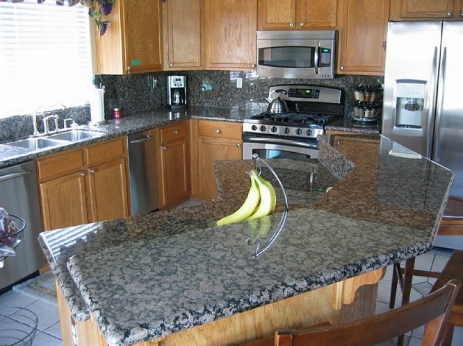 Granite kitchen countertops with oak cabinets