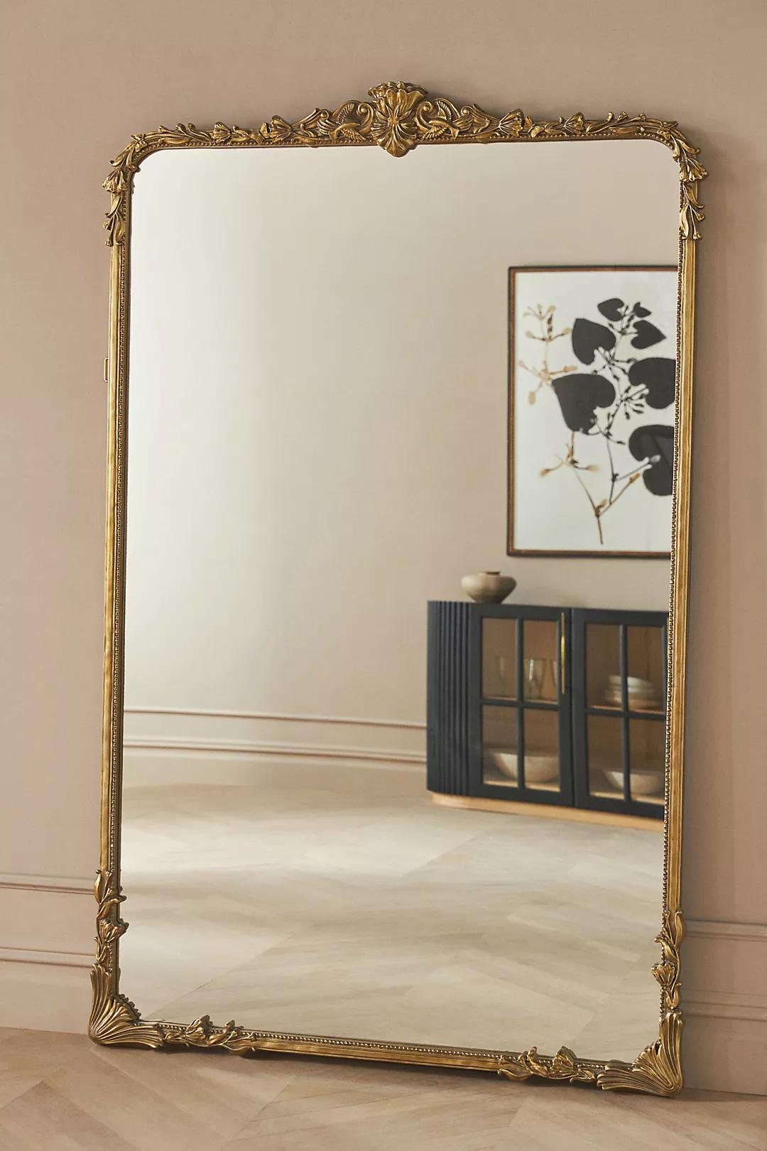 Framed mirrors in different rooms