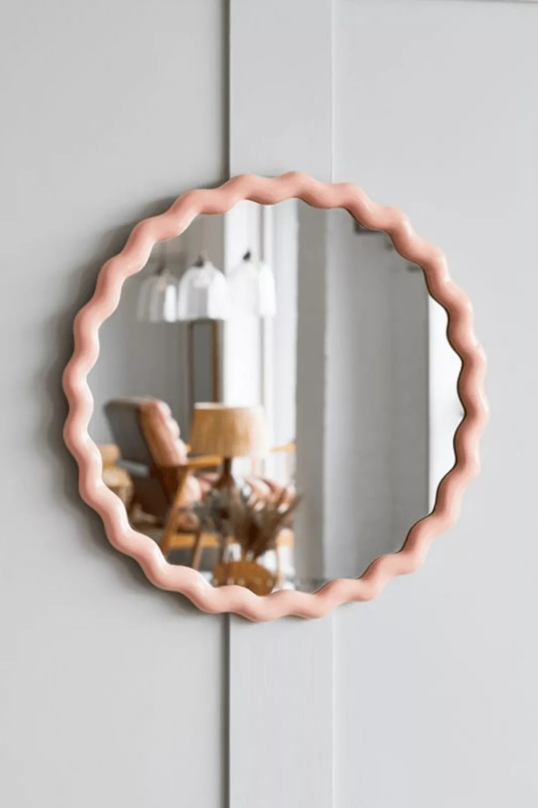 Framed mirrors in different rooms