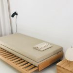 Guest Bed with a soft beige woollen fabric. From daybed to double bed. #bautier #guestbed