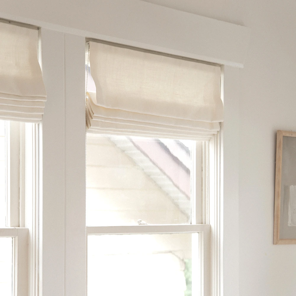 Keep the Rays away by using
Roman Blinds for your windows