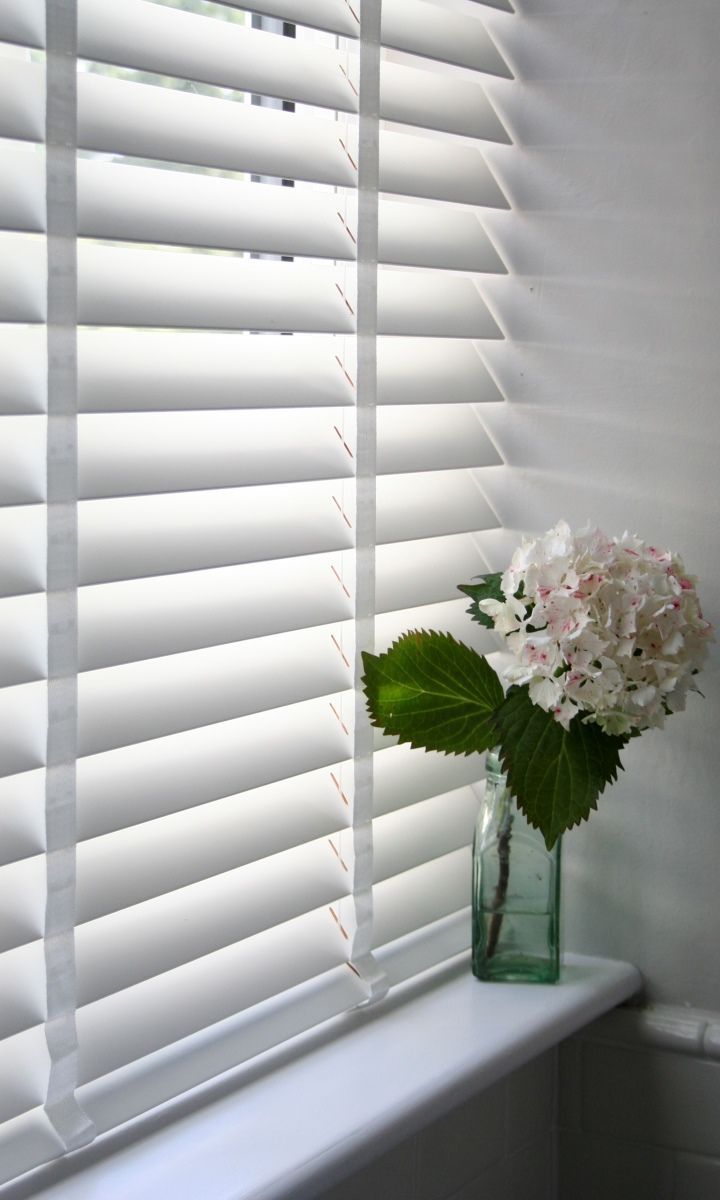 White wooden blinds to add
Attraction to your Home