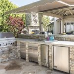 an outdoor kitchen at the home of mary and michael fry in IFQWEAL