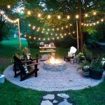 backyard lighting ideas cozy outdoor fire pit and string lights VNYMERP
