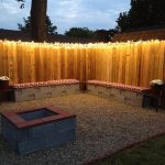 backyard lighting ideas simple fenceline christmas light illumination ZNPRUKE