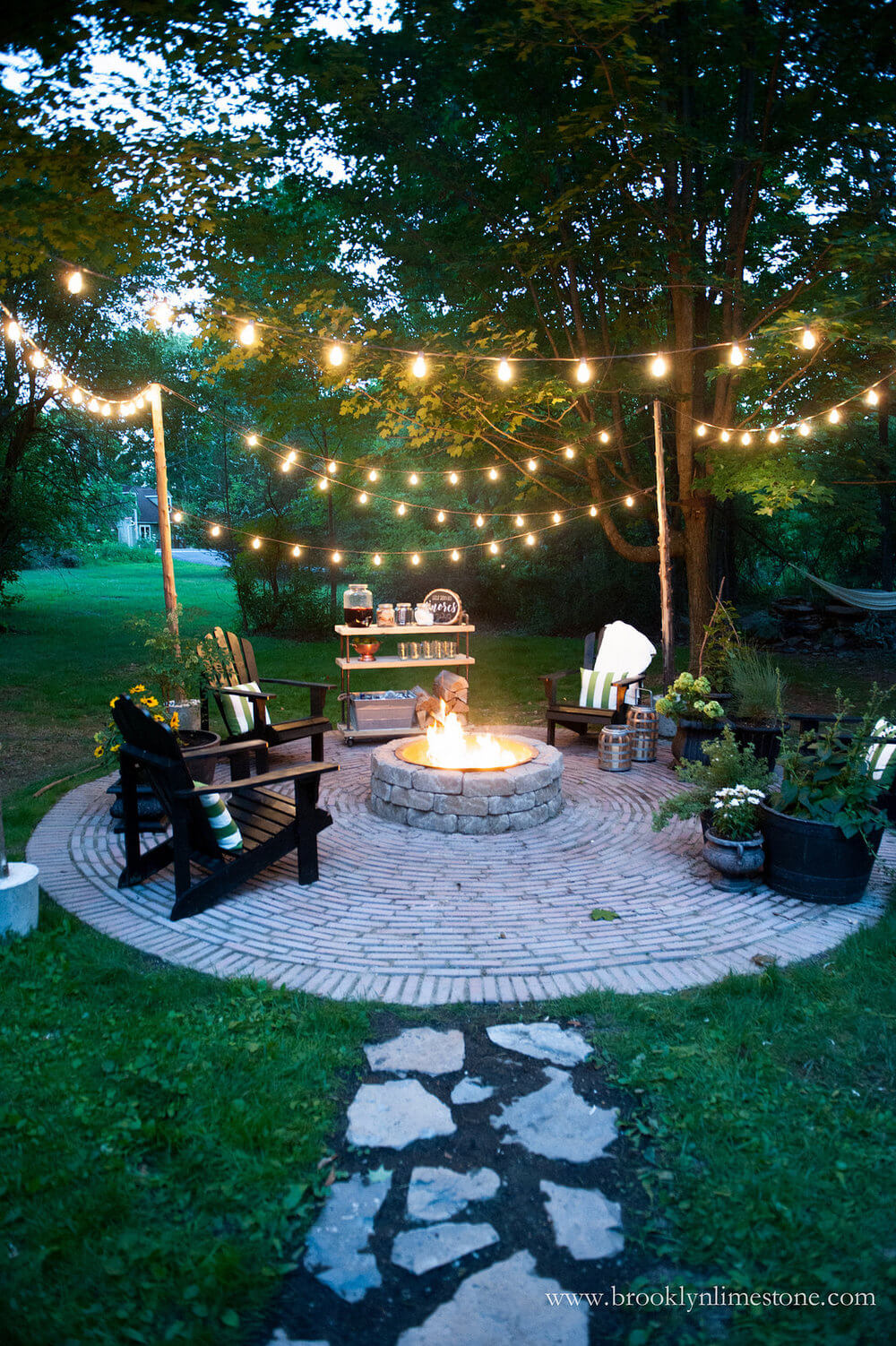 backyard lights cozy outdoor fire pit and string lights YTACYXT
